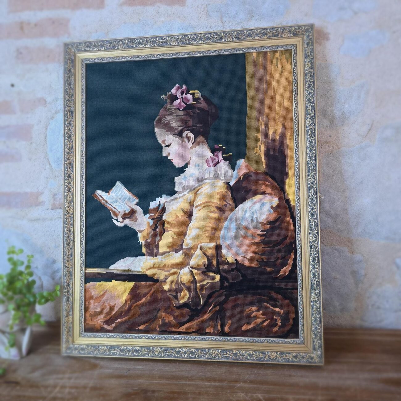 Grand canevas ancien, La Liseuse, Cadre doré