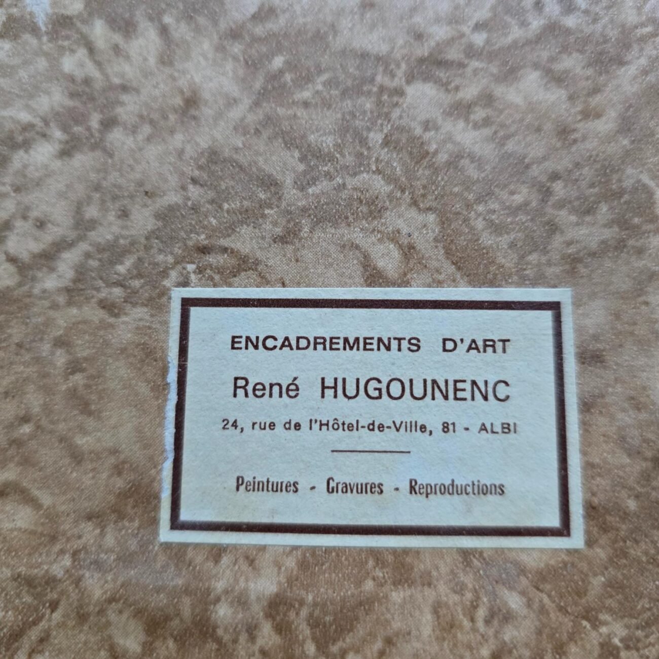 Étiquette “Encadrements d’art René Hugounenc, Albi” au dos du cadre ancien