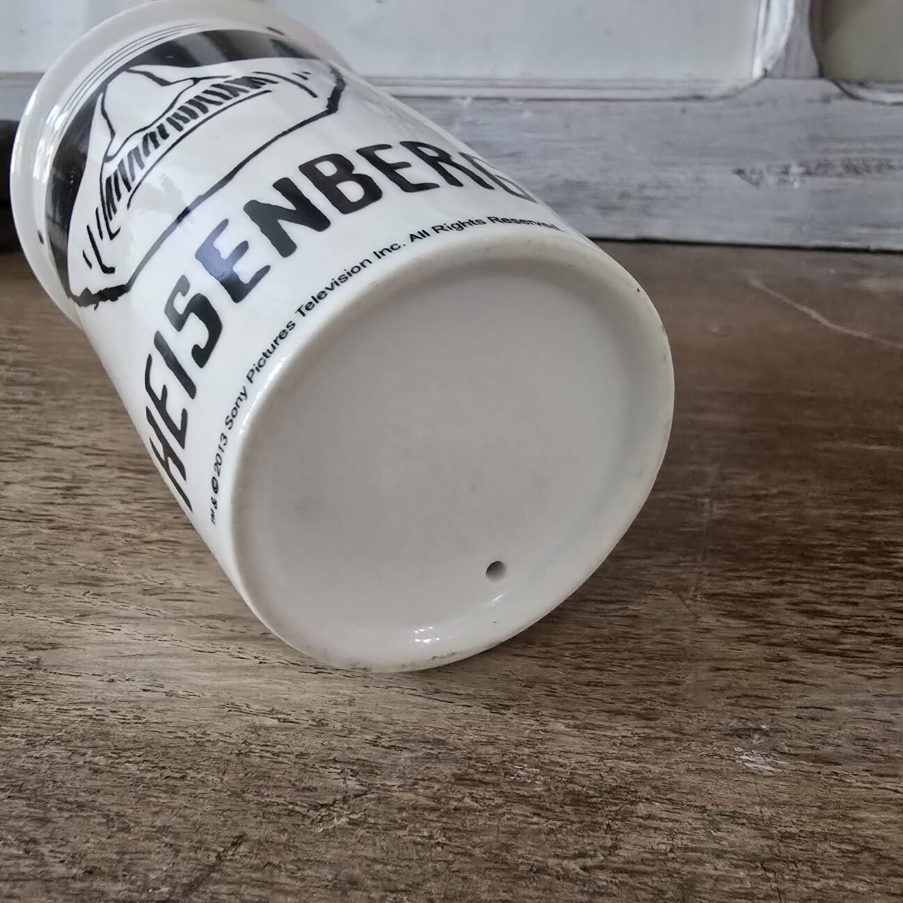 Mug en position couchée avec vue sur le desous.